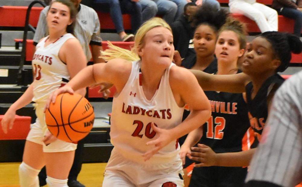 Fairless Pours In 18! Leads Ladycats to Win!