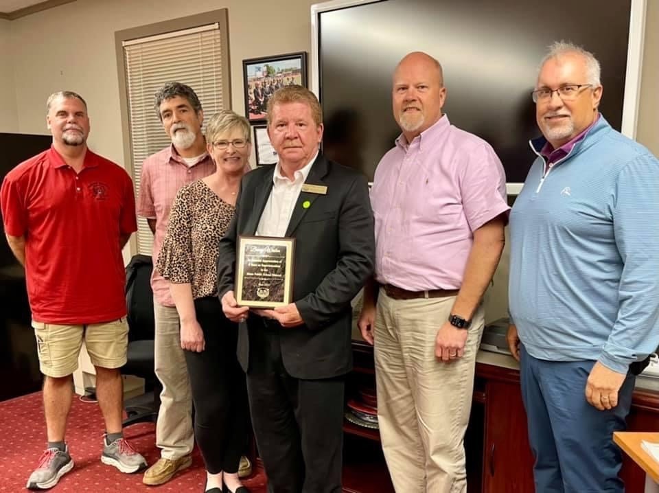 Weston Honored by Board !